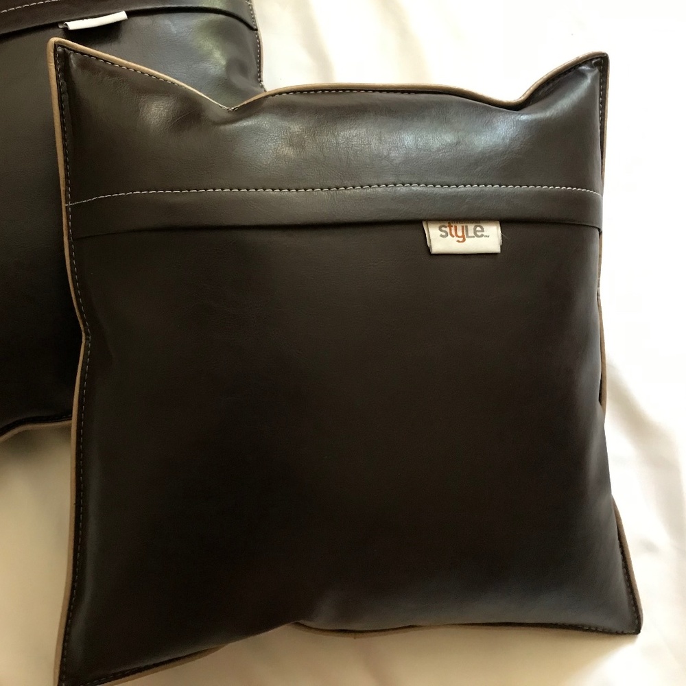 Two faux leather accentpillows - By Ty Pennington.